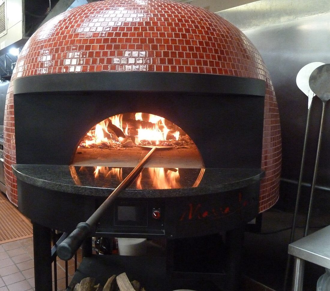 Flames inside our wood-fired oven